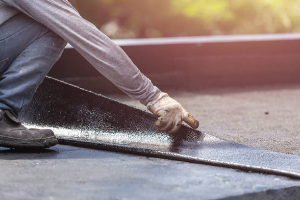 Professional Basement Waterproofing technician working in McDonald, PA
